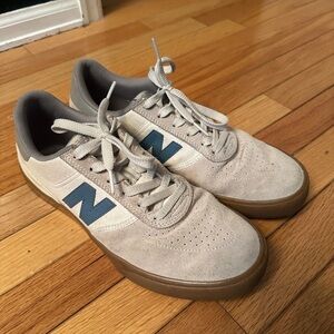 New Balance Men’s Light Gray Suede Sneakers with Blue 'N' and Gum Sole